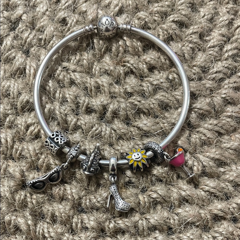 Pandora sterling silver bangle bracelet with charms